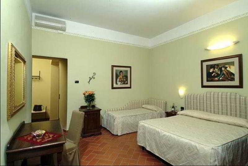 Hotel Caravaggio Florença Quarto foto